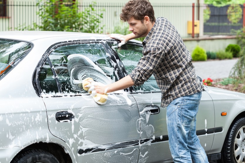 Man washing his car